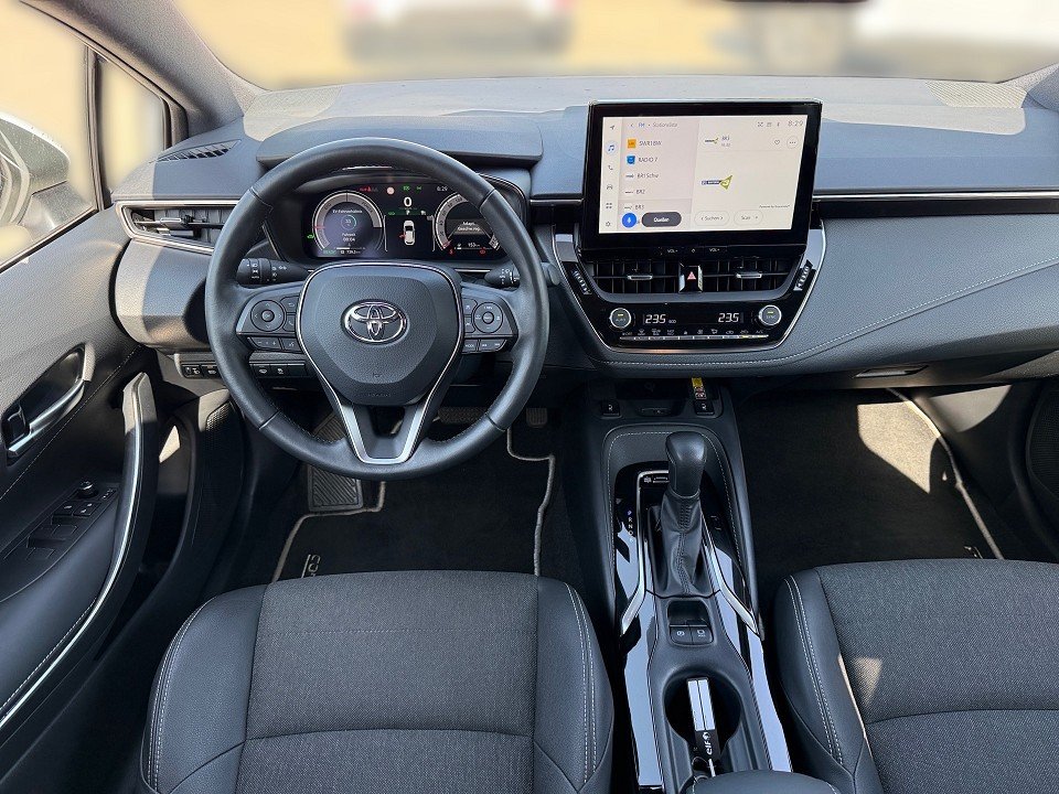 Fahrzeugabbildung Toyota COROLLA 1.8 HYBRID AUT TEAM D AHK TOP-ZUSTAND++ Hybrid Team D